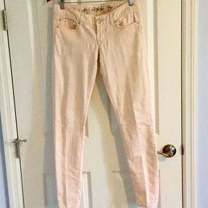 Pale pink low-rise hipster 5-pocket stretch jeans